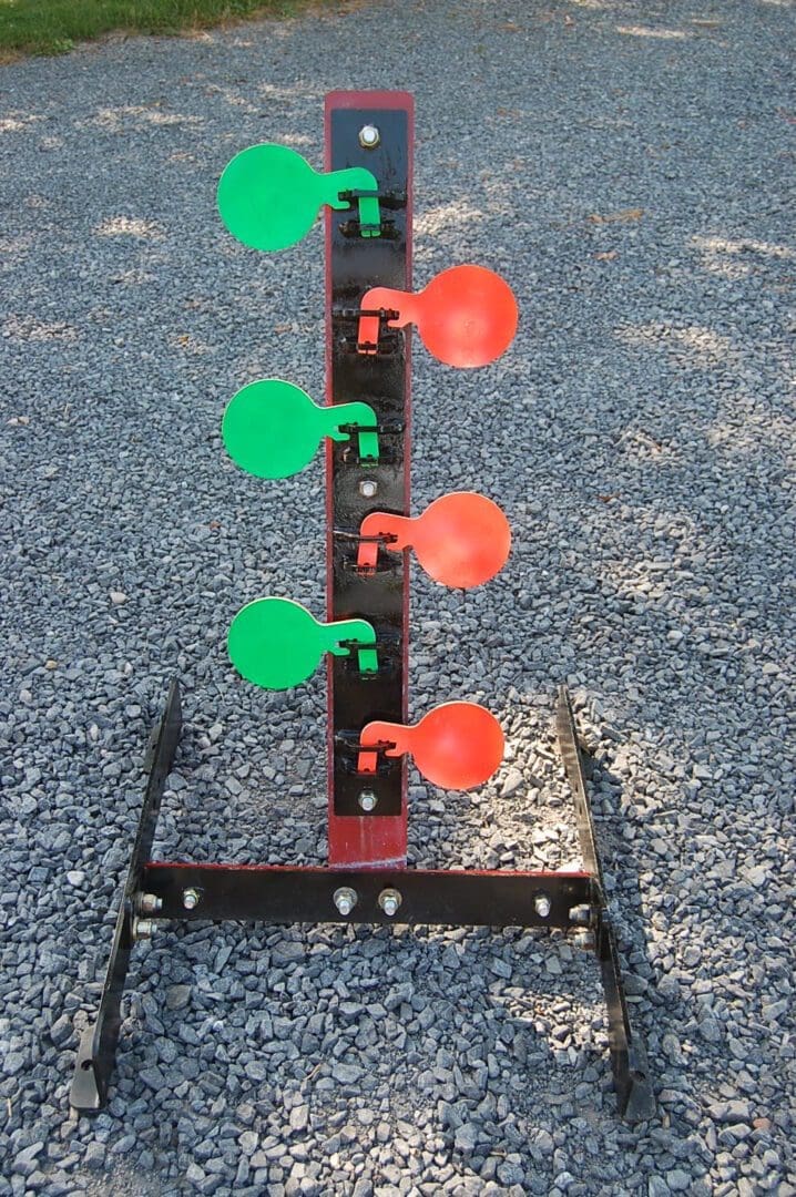 Hang Fast 6 plate rimfire dueling tree AR 500 rear view mounted on all-terrain adjustable base.